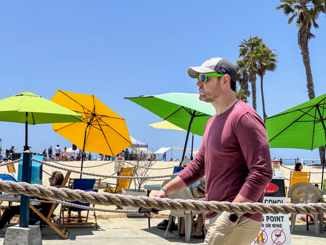 Man & beach umbrellas SM